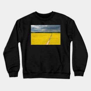Agricultural landscape, fields of yellow colza under moody cloudy sky Crewneck Sweatshirt